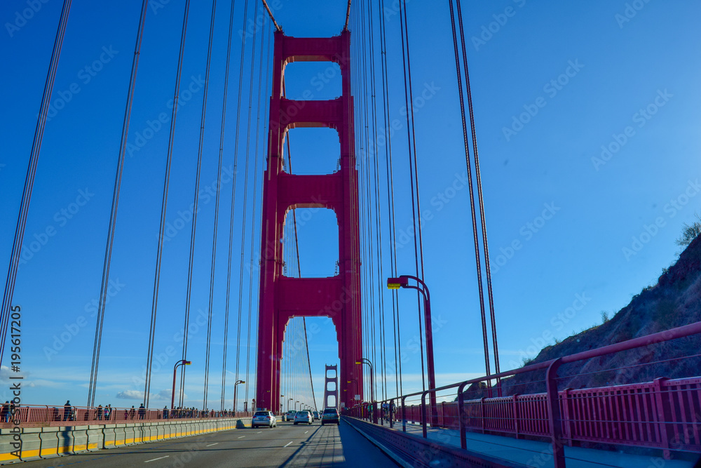 Fototapeta premium Driving over the Golden Gate Bridge, view directly from the Golden Gate Bridge in San Francisco