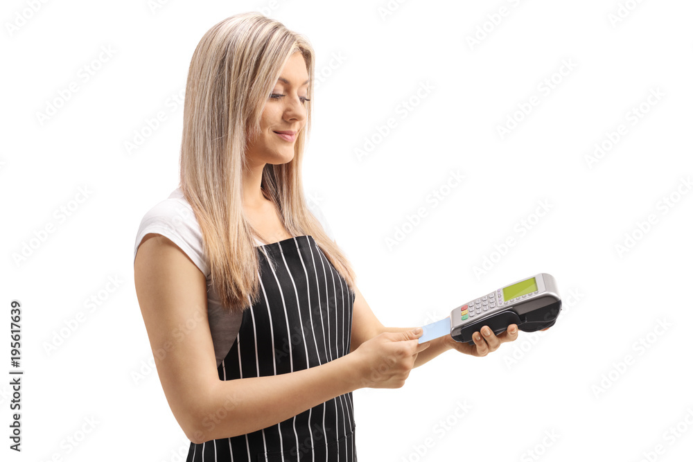 Waitress inserting a credit card in a payment terminal Waitress inserting a credit card in a payment terminal