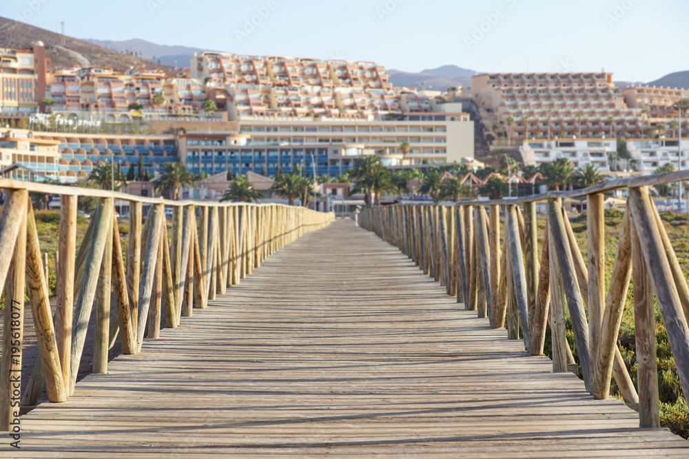wooden walkway with fences to the Guardamar del segura beach.Alicante,Spain