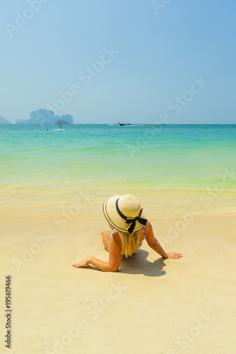 woman resting at the tropical Thailand Railay beach