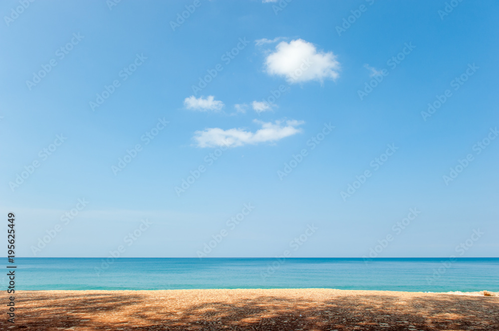 Tranquil beach and blue sky on sunny summer.