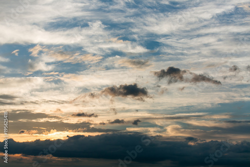Beautiful sky with clouds and sun. Sunset sky with clouds.