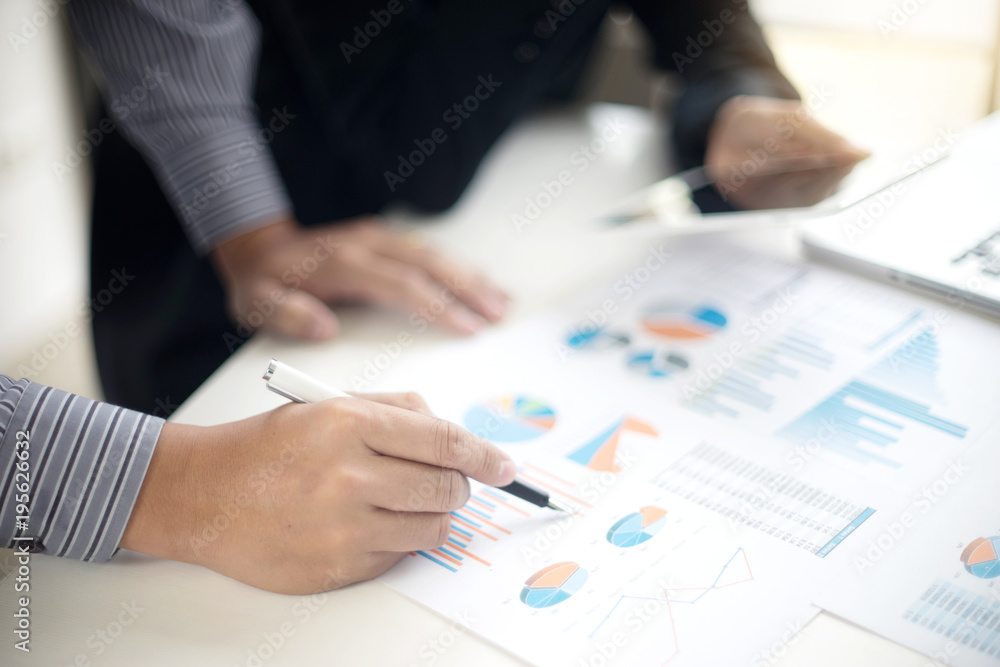 Business businessman work on the table use computer and tablet Business businessman work on the table use computer and tablet