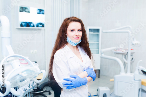 dentistry student standing in a dental treatment room