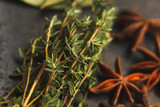 Anise stars and two sprigs of thyme