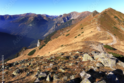 Poland, Tatra Mountains, Zakopane - Posredni Wierch Gryczkowy and Goryczkowa Czuba peaks with Czerwne Wierchy peaks and Western Tatra mountain range panorama in background