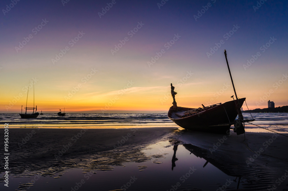 Fishing boat on the beach at Mae Ramphueng in the evening.