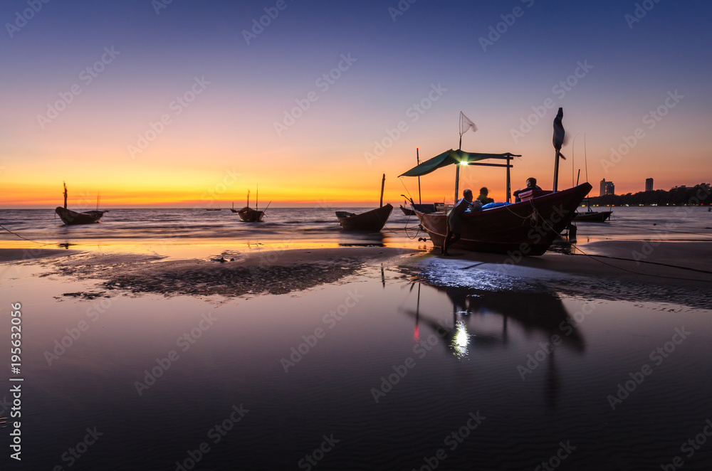 Fishing boat on the beach at Mae Ramphueng in the evening.