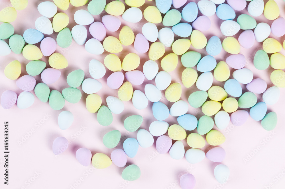pastel colored easter eggs on a pink background pastel colored easter eggs on a pink background