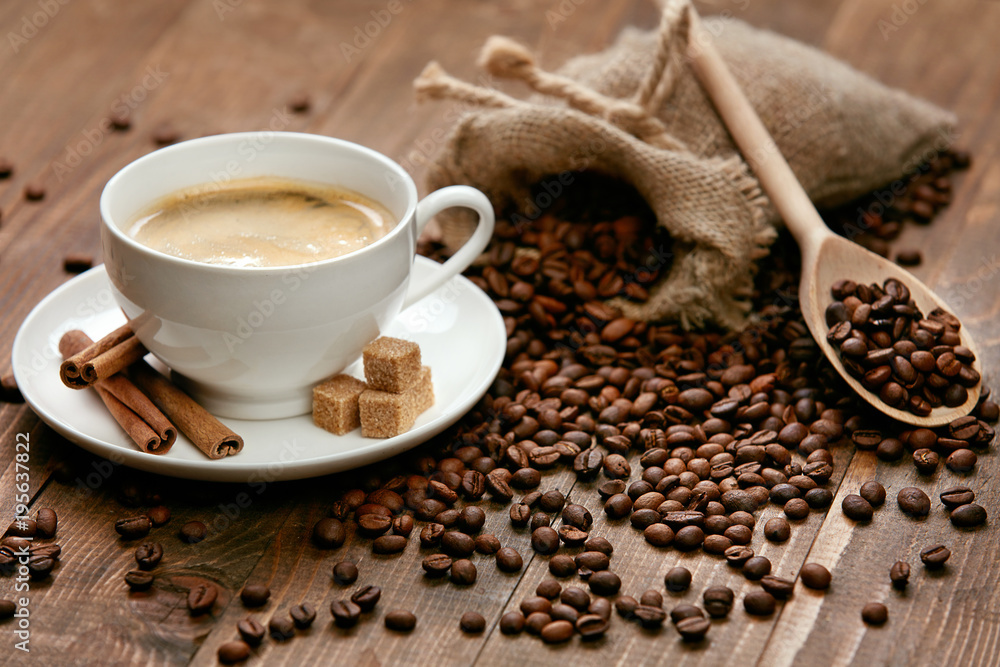 Cup Of Coffee. Hot Drink And Beans On Table. Cup Of Coffee. Hot Drink And Beans On Table.
