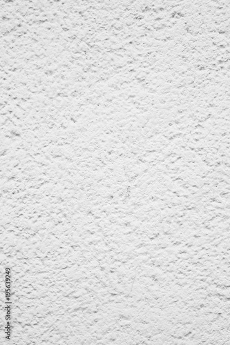 White ragged, rough wall concrete background.