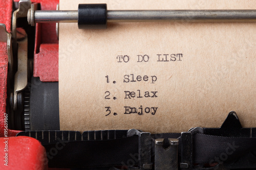 To do list sleep, relax, enjoy - text message on the typewriter close-up