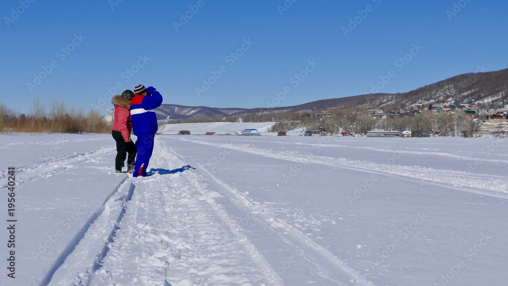 married couple in winter on a walk