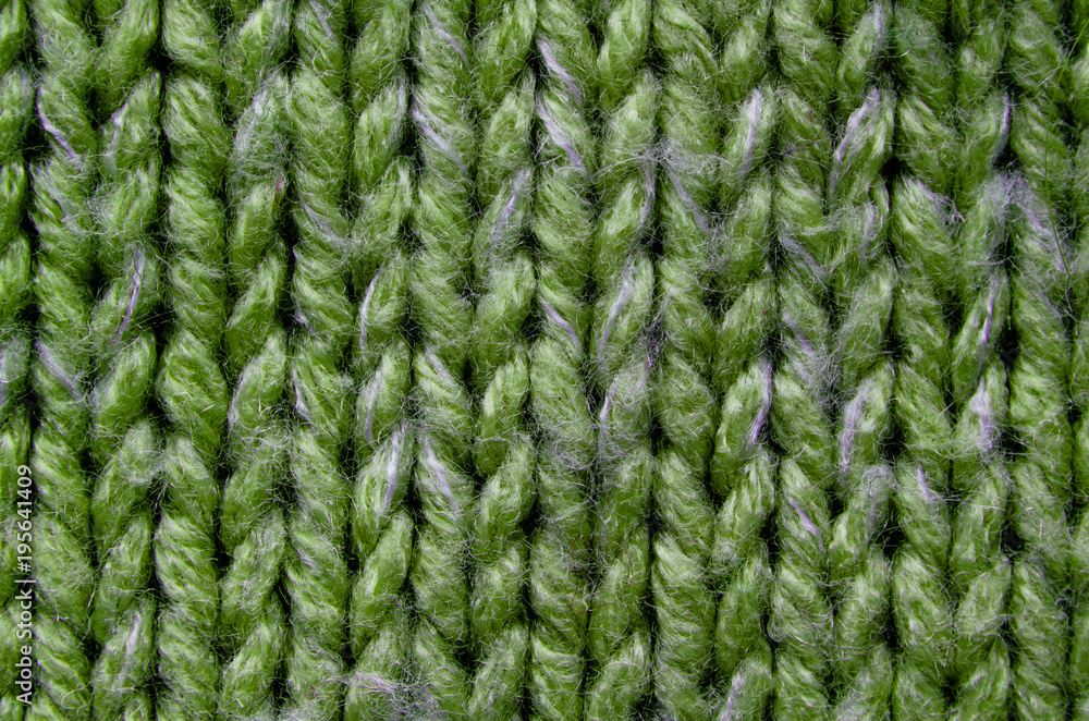 Green Knit Texture Close-Up. Knit Sweater Blank Background Green Knit Texture Close-Up. Knit Sweater Blank Background