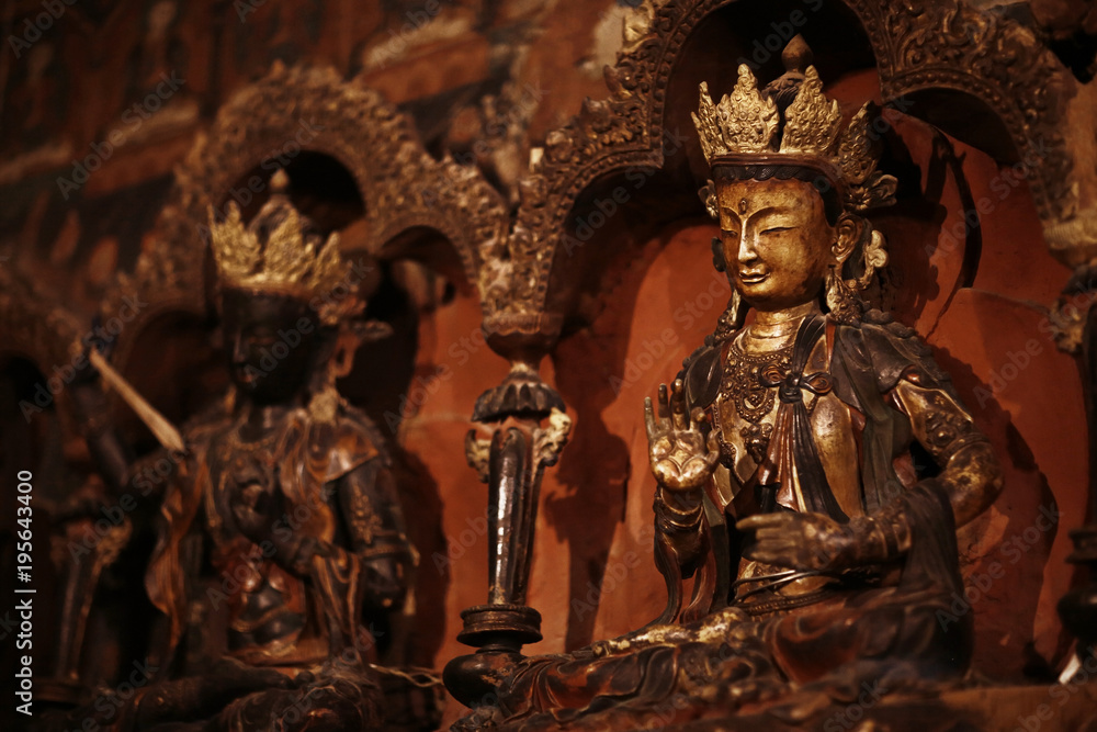 Fototapeta premium Buddhist statues in the temple tuibet