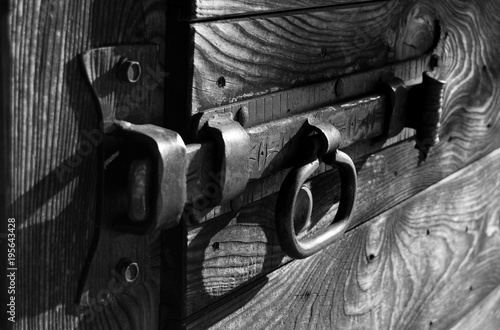 Old metal lock in black and white photo