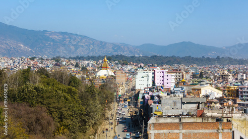 Boudhanath road and Boudhanath stupa as seen from a vantage point in Kathmandu, Nepal
