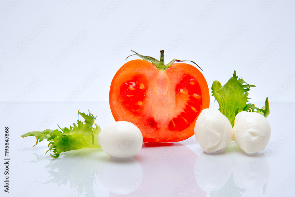 Tomato and cheese mozzarella organic food on white background Tomato and cheese mozzarella organic food on white background