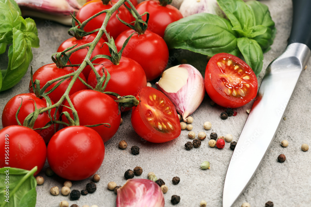 tomato and italian ingredient. Ripe tomatoes with fresh basil, garlic tomato and italian ingredient. Ripe tomatoes with fresh basil, garlic