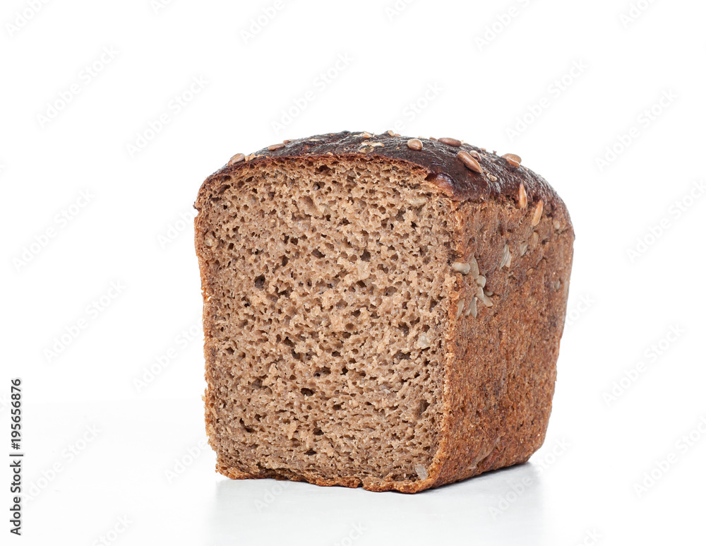 A half of rye bread on a white background. A half of rye bread on a white background.