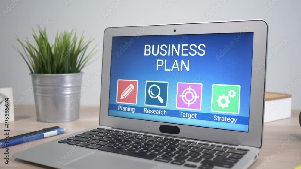 Business plan strategies showing on a laptop computer screen sitting on a desk. Camera is slowly turning around the computer. Business plan strategies showing on a laptop computer screen sitting on a desk. Camera is slowly turning around the computer.