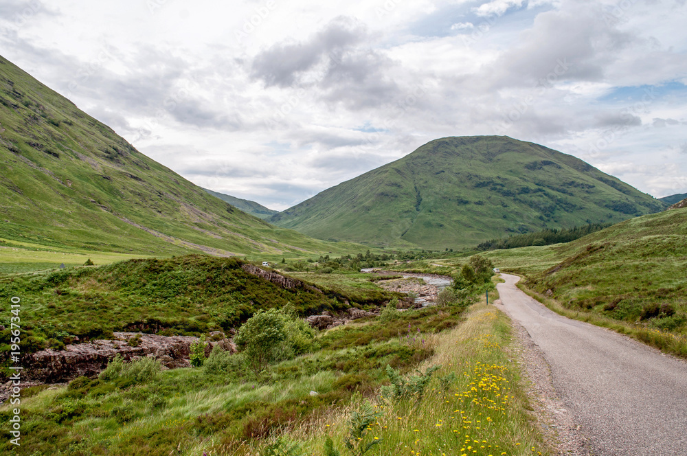 High massive rocky hills in the Scottish Glen Coe area High massive rocky hills in the Scottish Glen Coe area