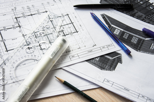 Architect's desktop. Plan of house. Architect workplace. Work with drawings. Office work. Engineer calculates area of the room. Architect's tools.