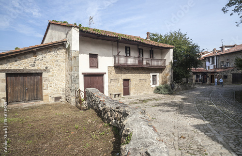  Typical house and street view in touristic village of Santillana del Mar, province Santander, Cantabria, Spain.