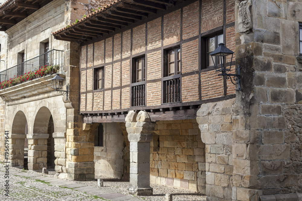 Village street, typical houses in touristic village of Santillana del Mar, province Santander, Cantabria, Spain