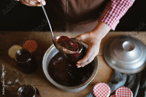 Preparing homemade strawberry jam