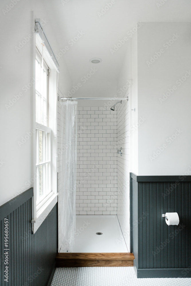 modern bathroom with walls painted half black and half white Stock ...