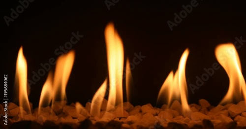 Gas fireplace with burning fire, loop-ready backdrop