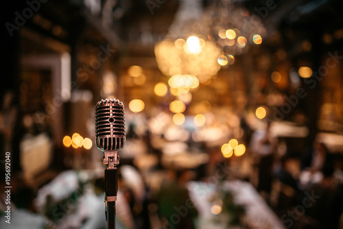 a single microphone on a stage photo