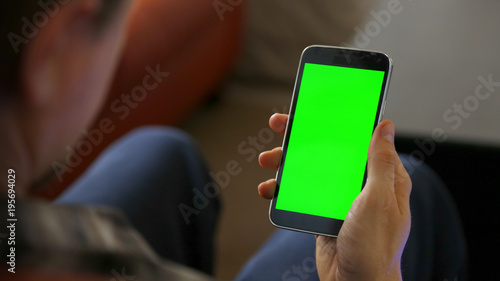 Man Using Smart Phone with Chroma Green Screen