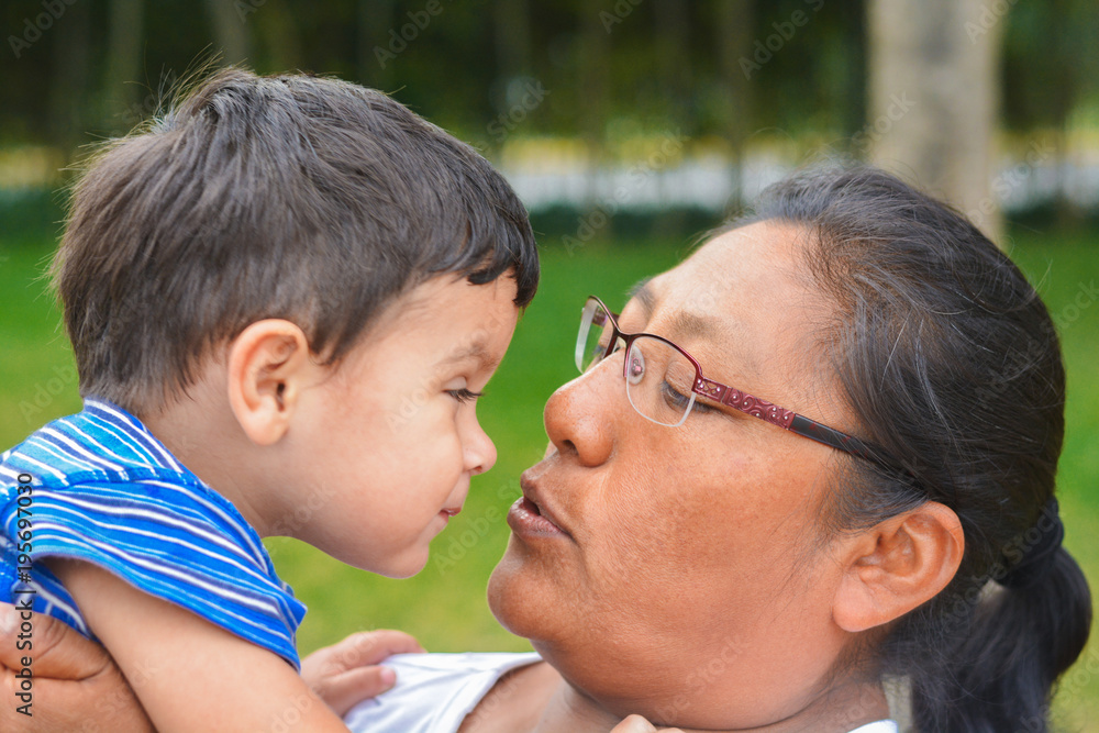 Tender portrait of latin mother and little son. Tender portrait of latin mother and little son.