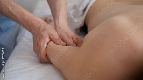 Spa. The hands of the massage therapist make a massage on the arm