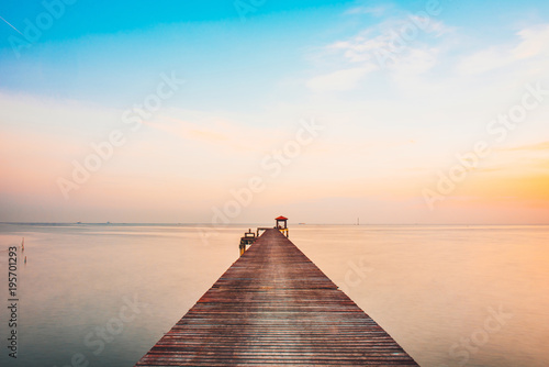 Vacation and Holiday concept - Wooden pier between sunset in Samut Prakan, Thailand,Summer, Travel