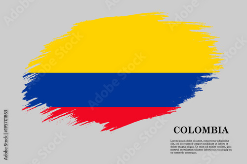 Grunge styled flag Colombia. Brush stroke background