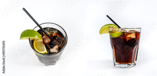 Alcoholic cocktail: Rum and cola  with ice cubes, lime