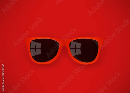 red sunglasses on red background