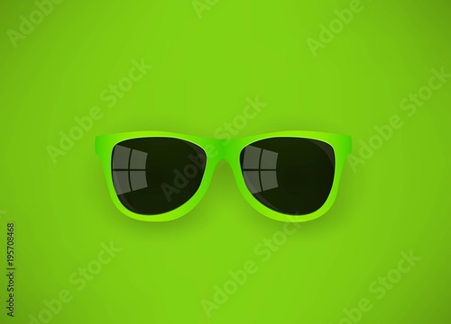 green sunglasses on a green background