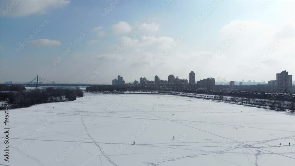Winter Kiev, view of the Dnieper, river, ice, clouds, houses, snow, bridge, water. Ukraine Winter Kiev, view of the Dnieper, river, ice, clouds, houses, snow, bridge, water. Ukraine