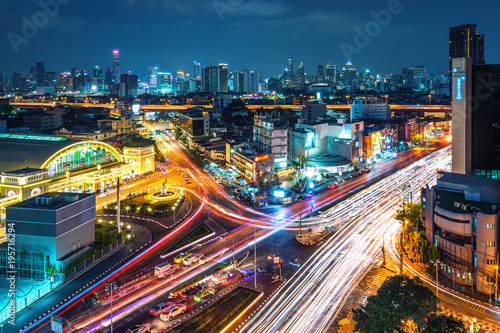 Bangkok cityscape and traffic at night in Thailand.