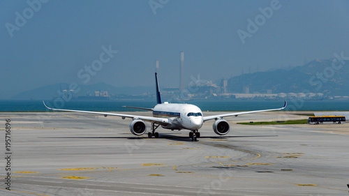 Airplane taxiing at the airport