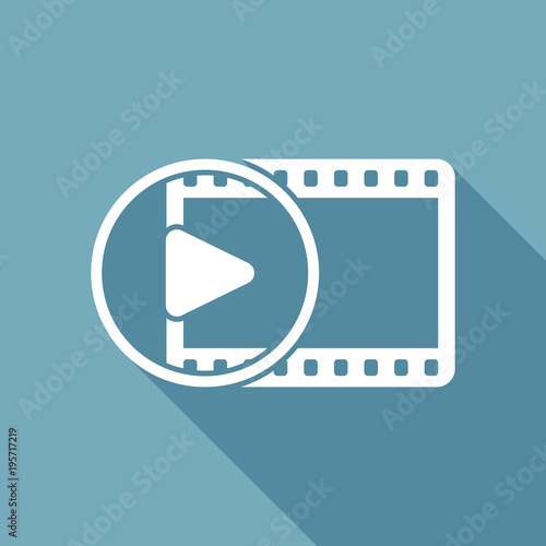 movie strip with play symbol in circle. simple silhouette. White flat icon with long shadow on background