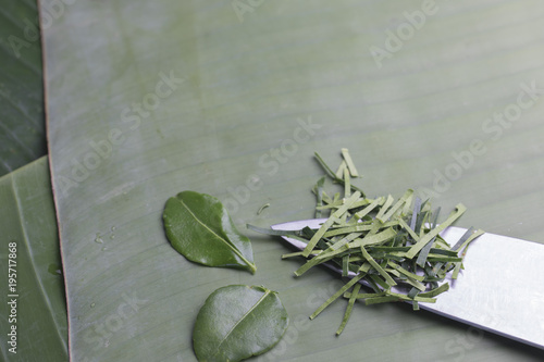 Lime leaf on banana leaf photo