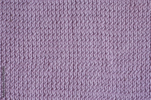 Lilac knitting wool texture background.