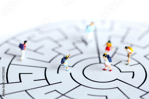 Miniature people : children stand on maze ,fun and Education concept.
