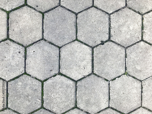 Gray figured pavement with a scuffs.
