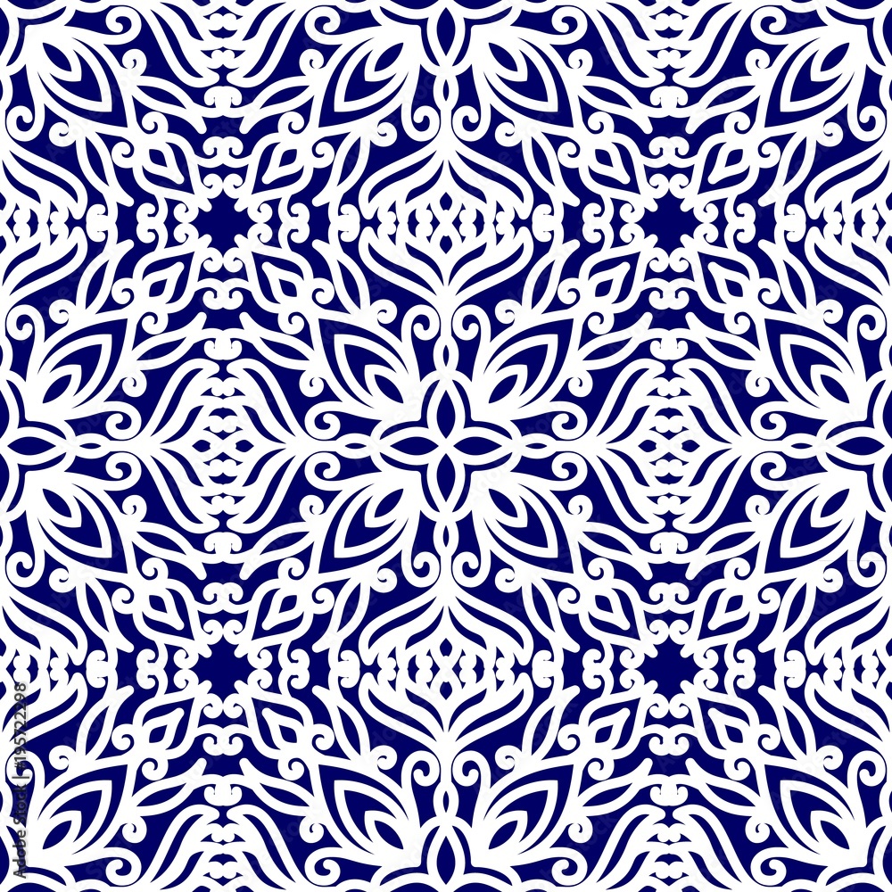 Seamless pattern with ethnic ornaments with curls. White floral pattern on a blue background. Seamless pattern with ethnic ornaments with curls. White floral pattern on a blue background.